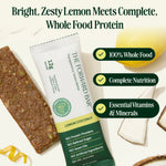 The Forward Bar lemon coconut protein bar with lemon and coconut pieces on a white background - view 5