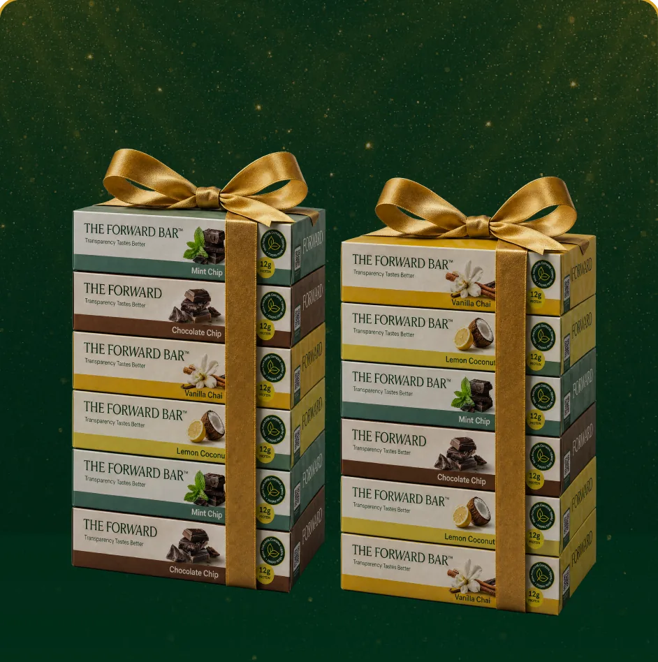 Two gift-wrapped stacks of Forward Bar boxes