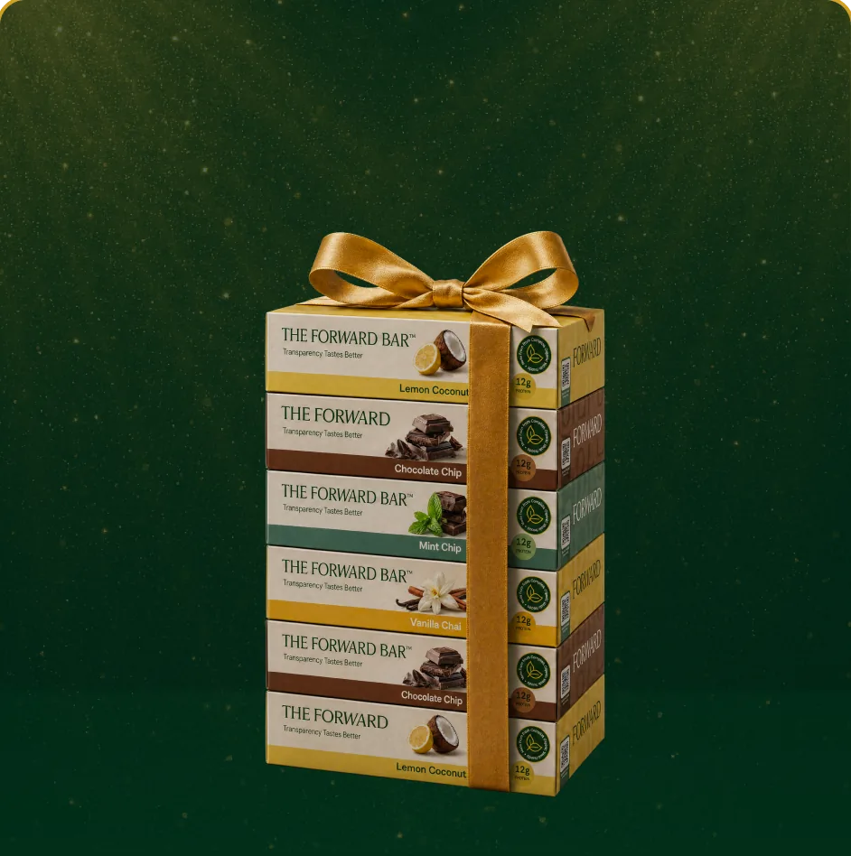 A gift-wrapped stack of Forward Bar boxes